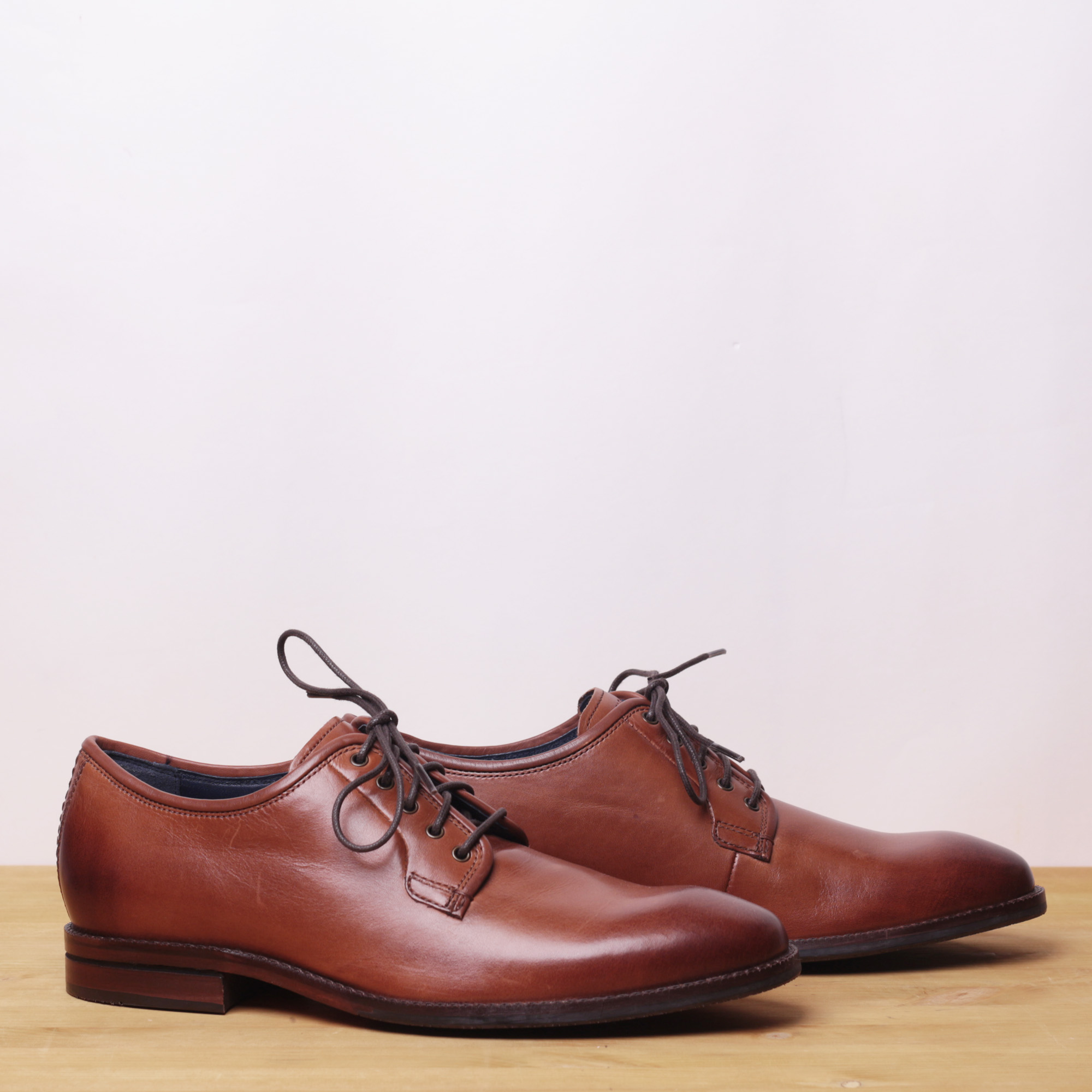 Cole Haan Warner Grand Postman Cognac 